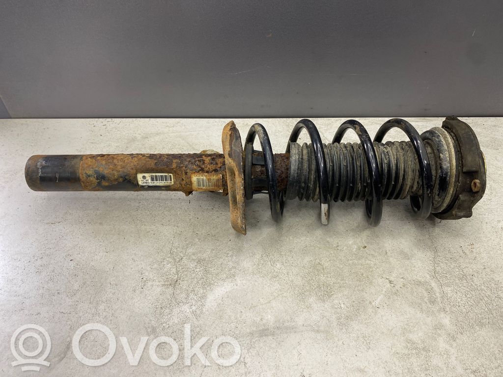 Volkswagen Golf V Amortyzator osi przedniej ze sprężyną 