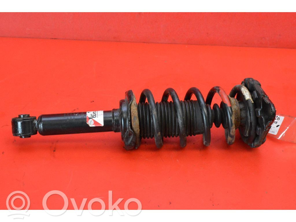 Nissan Almera Tino Galinis amortizatorius
