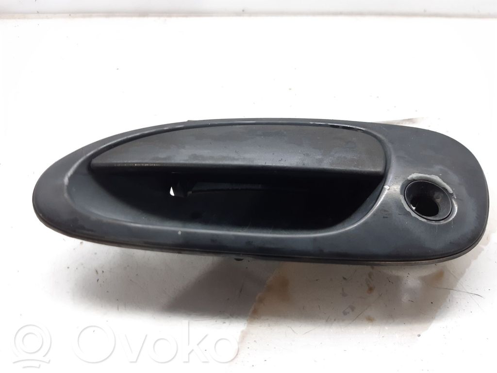 Mazda 323 F Manecilla externa puerta delantera 