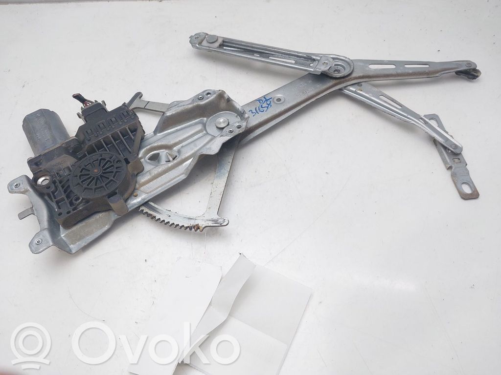 Opel Zafira A Elektryczny podnośnik szyby drzwi przednich 