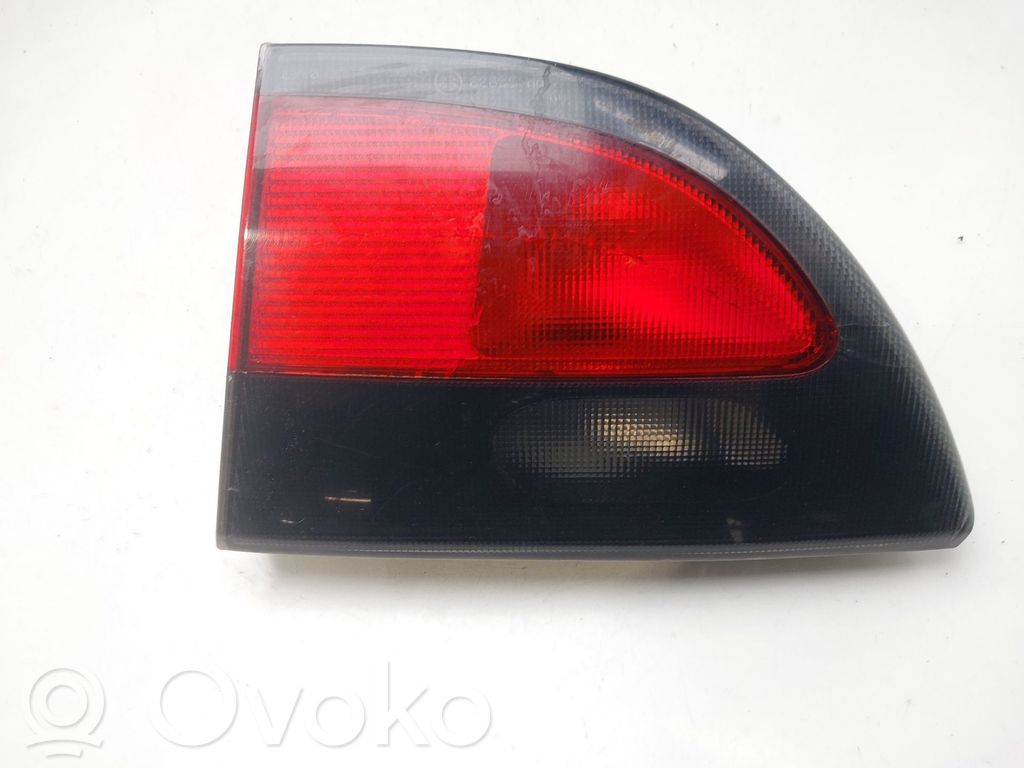 Renault Megane I Galinis žibintas dangtyje 