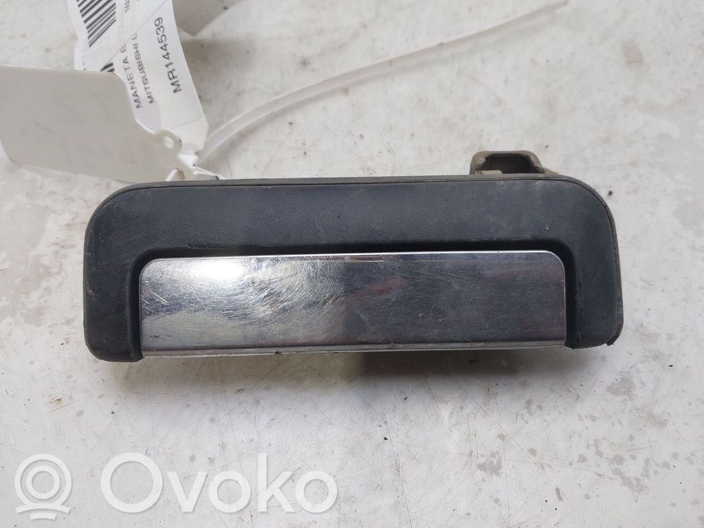 Mitsubishi L200 Manecilla externa puerta delantera 