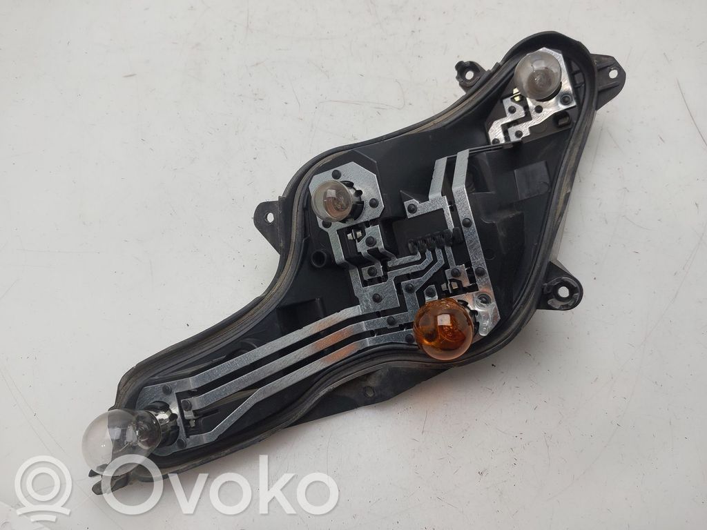 Opel Insignia A Takavalon polttimon suojan pidike 