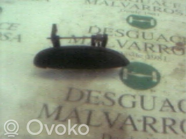 Manecilla externa puerta delantera