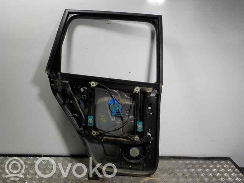 Volkswagen Touareg I Elektryczny podnośnik szyby drzwi tylnych 