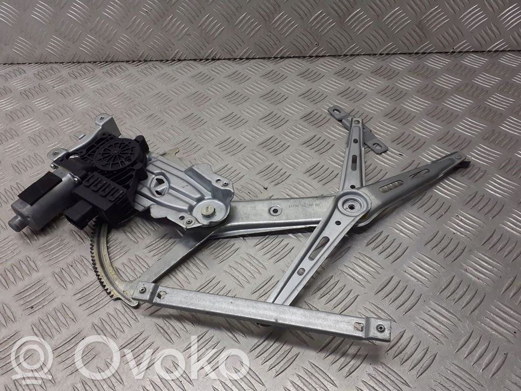 Opel Zafira B Elektryczny podnośnik szyby drzwi przednich 