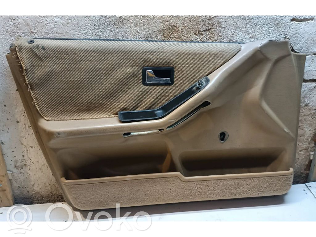Front door card panel trim
