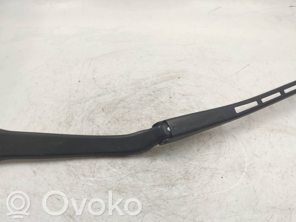 Front wiper blade arm