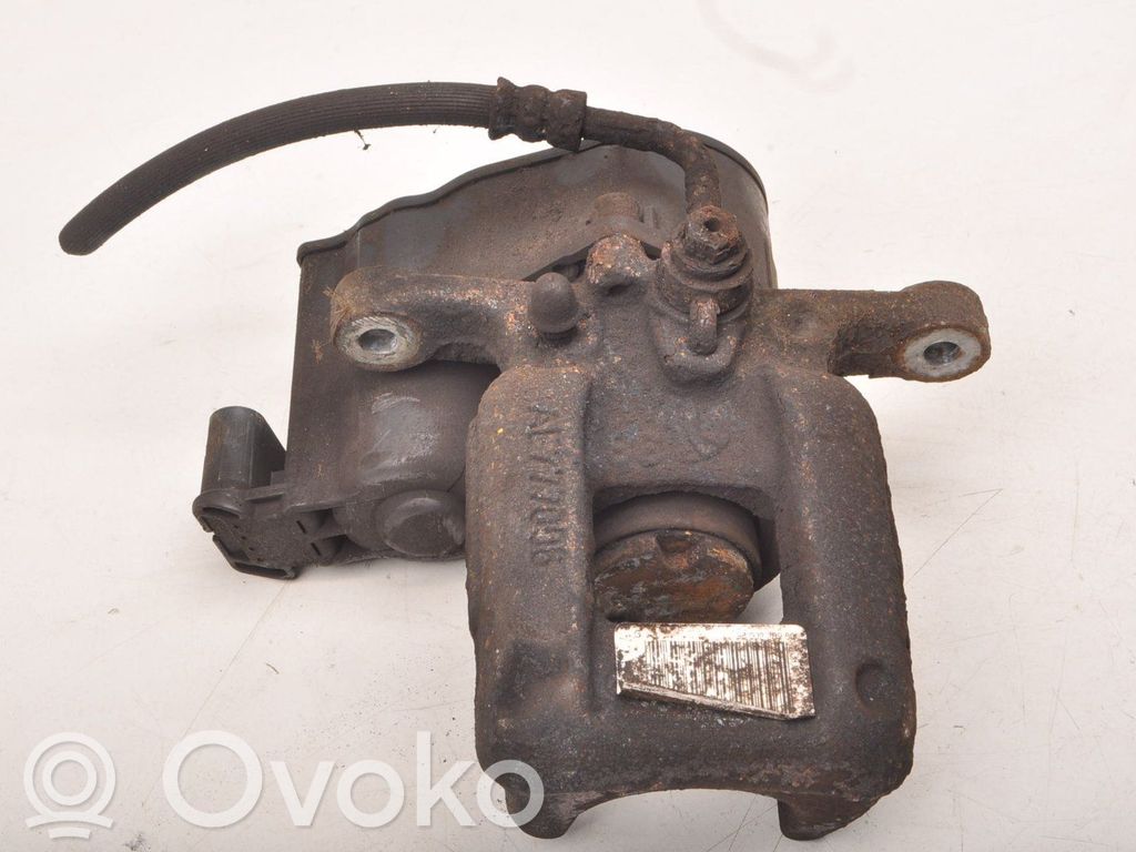 Citroen C4 II Picasso Tylny zacisk hamulcowy 