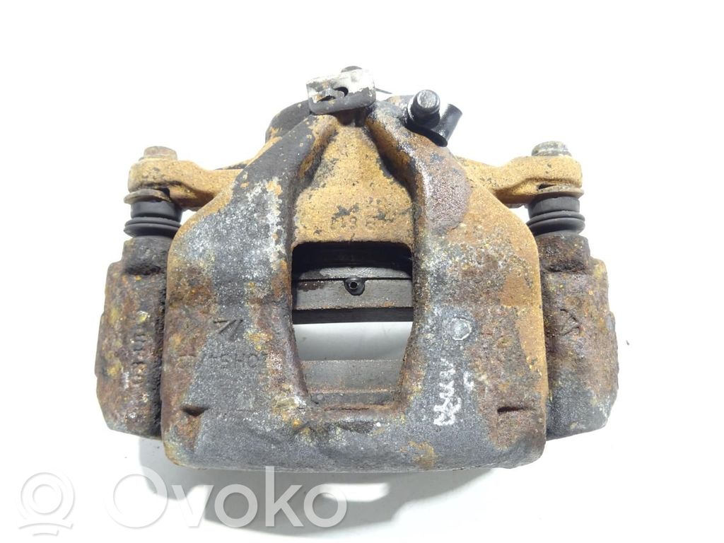 Opel Combo D Front brake caliper 