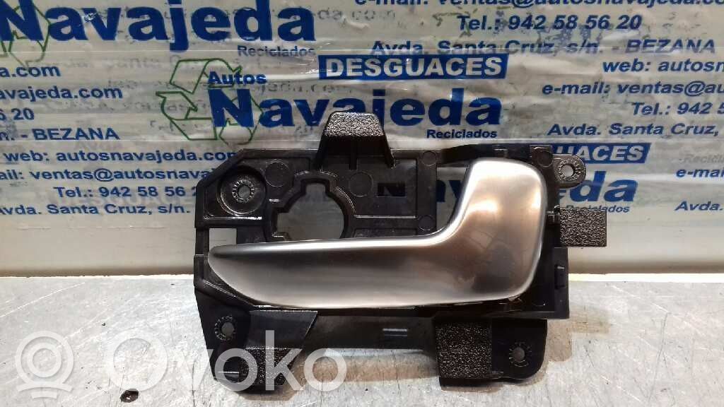 Manecilla interna puerta delantera