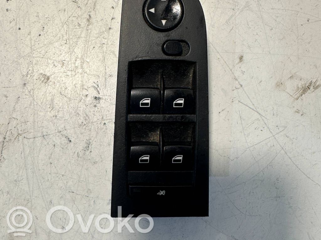 Electric window control switch   6948628