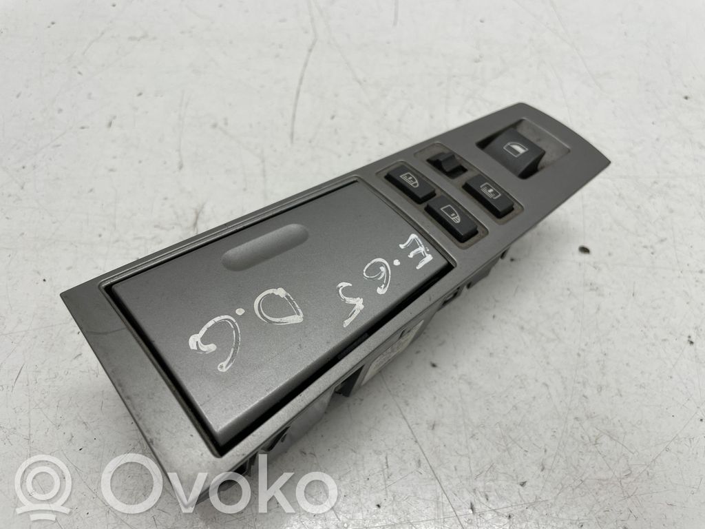 Electric window control switch   6917108
