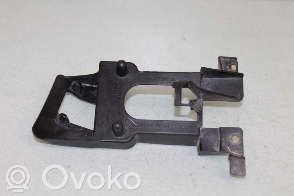 Mazda 5 Headlight washer spray nozzle 