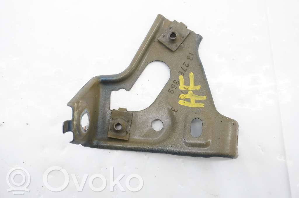 Opel Astra J Uchwyt / Mocowanie błotnika przedniego 