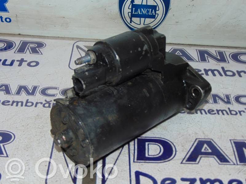 Opel Corsa D Стартер 