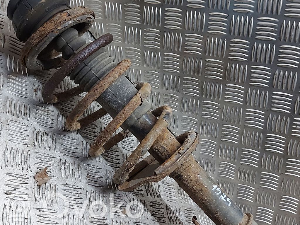 Front shock absorber with coil spring