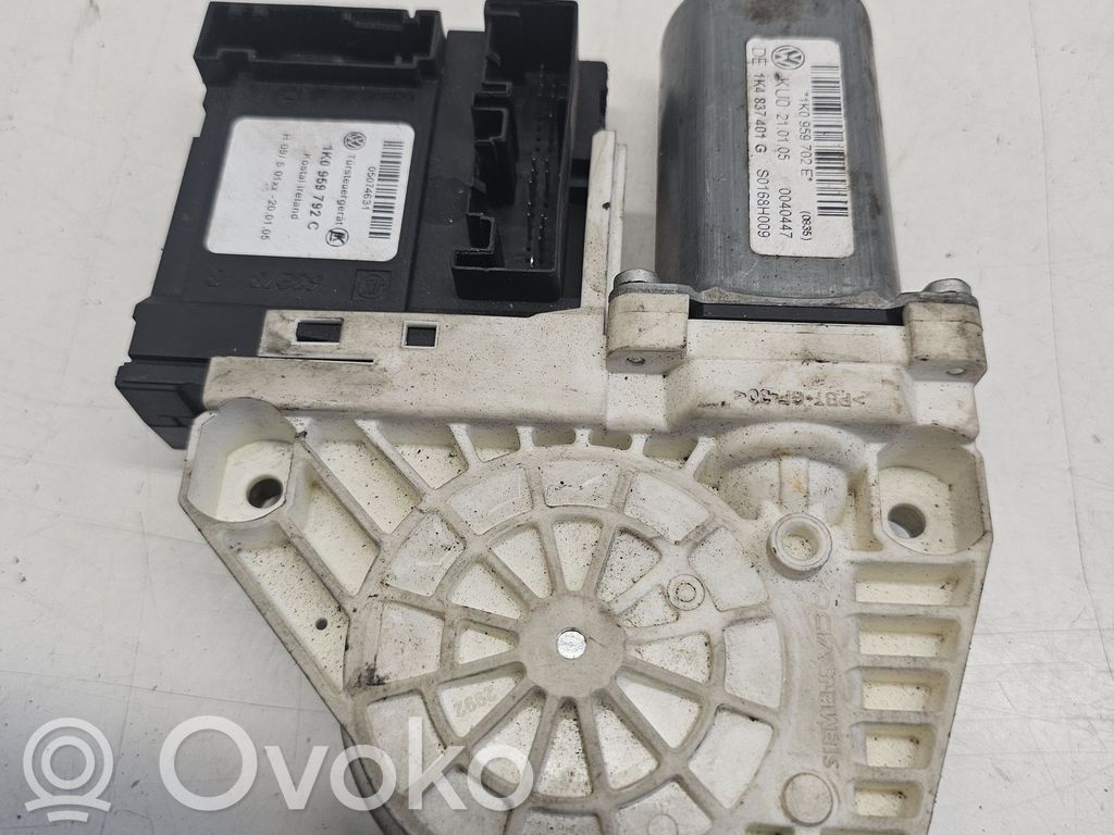 Volkswagen Touran I Front door window regulator motor 