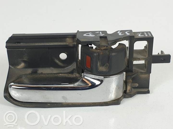 Toyota Corolla E120 E130 Takaoven sisäkahva
