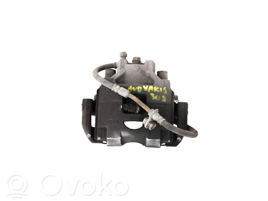 Toyota Yaris Zacisk hamulcowy przedni 