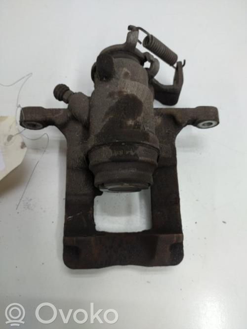 Opel Astra J Tylny zacisk hamulcowy 