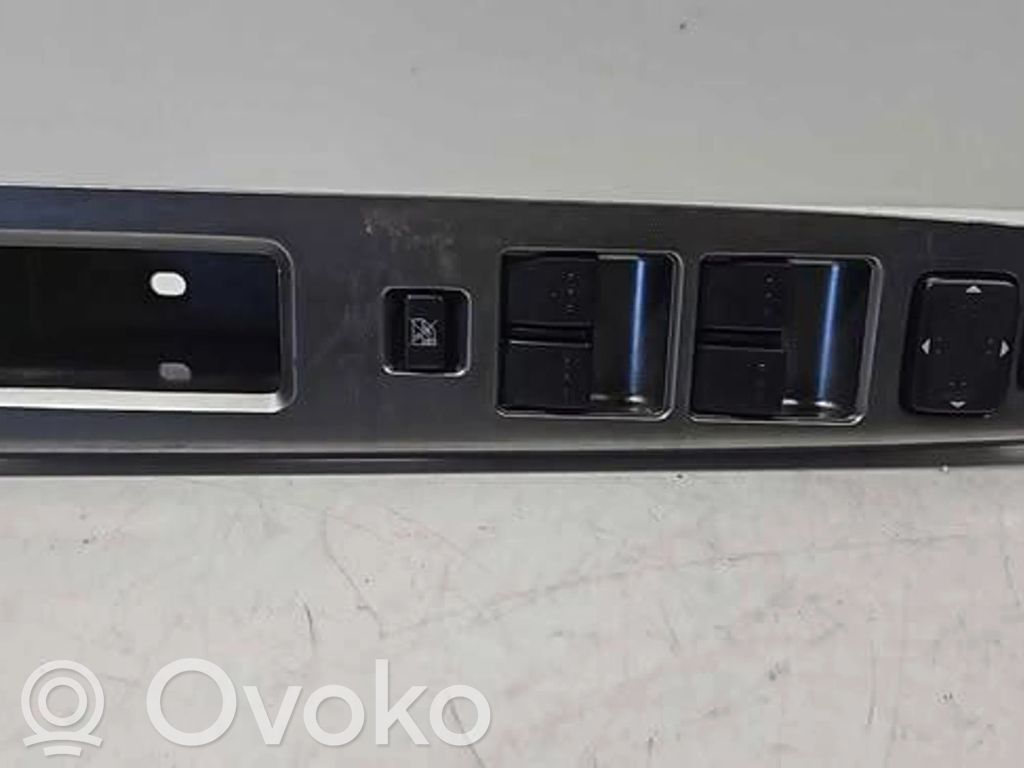 Mazda 5 Front door window switch trim 