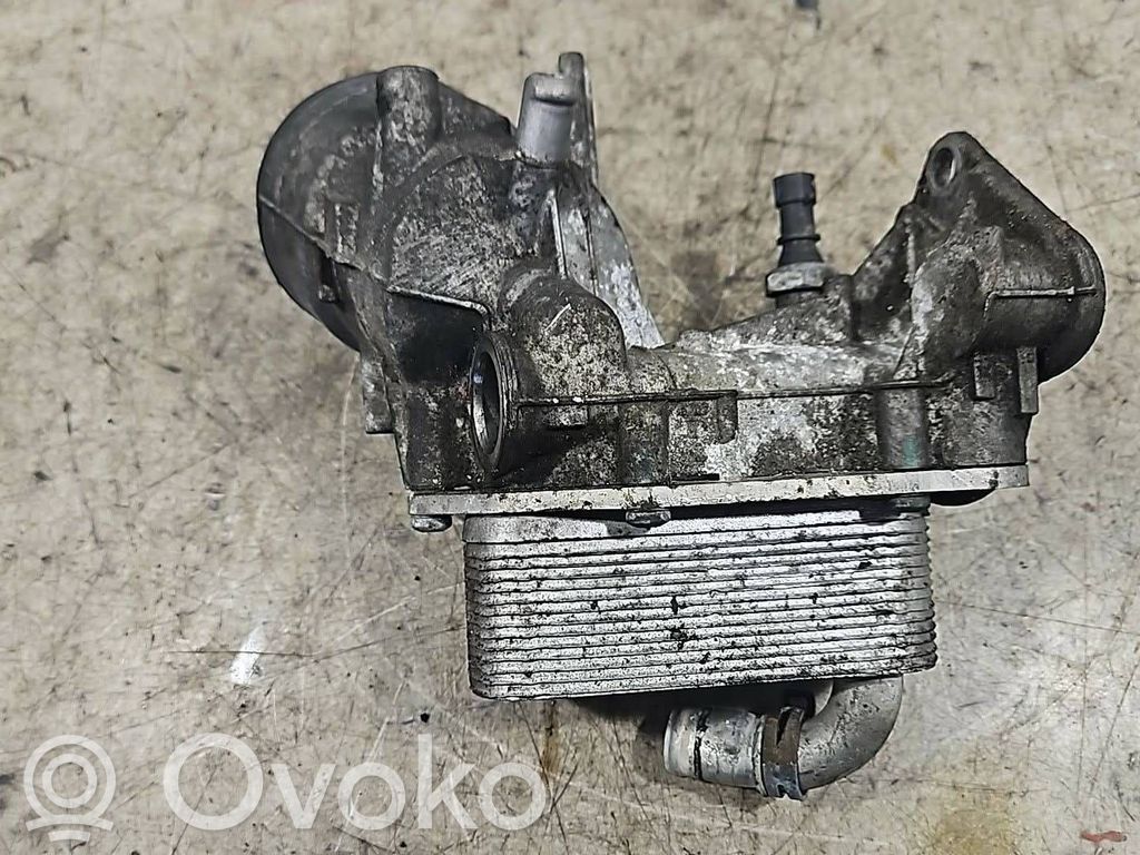 Opel Astra J Oil filter mounting bracket 