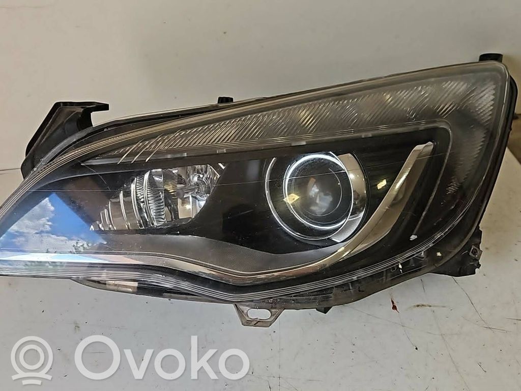 Opel Astra J Lampa przednia 