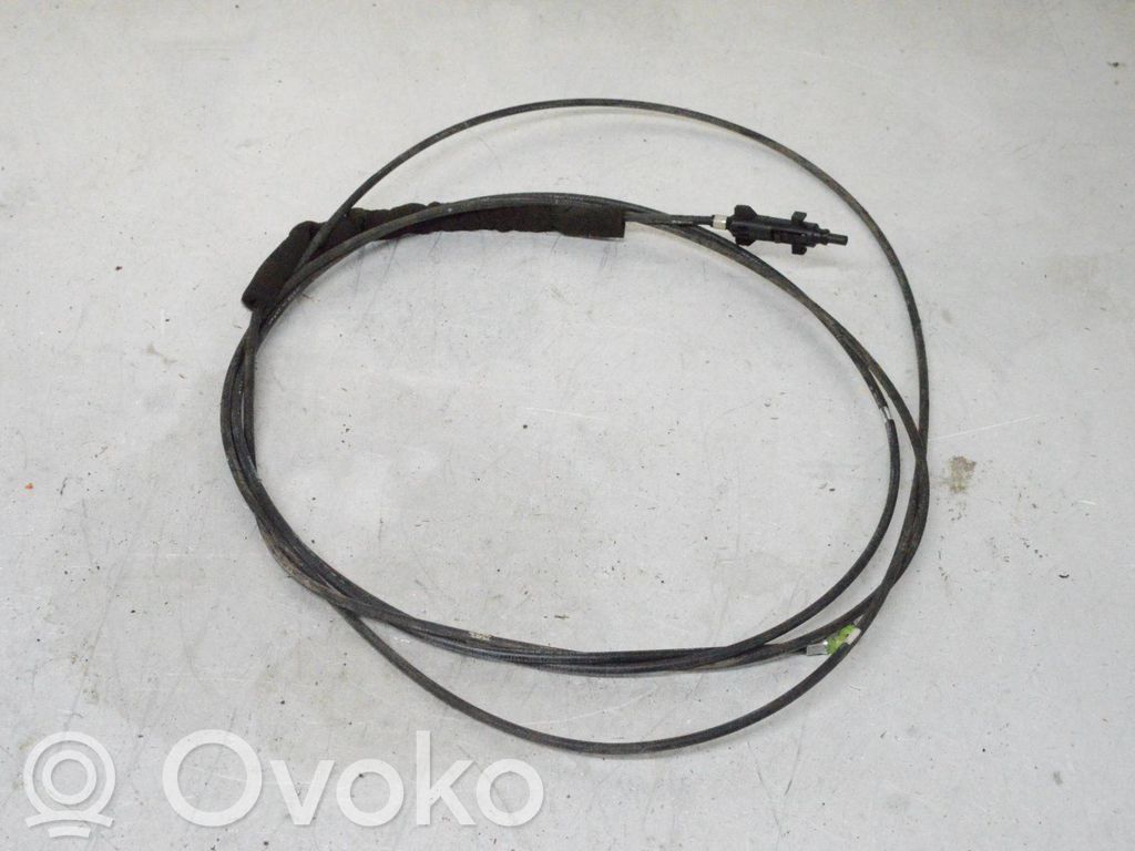 Fuel cap flap release cable