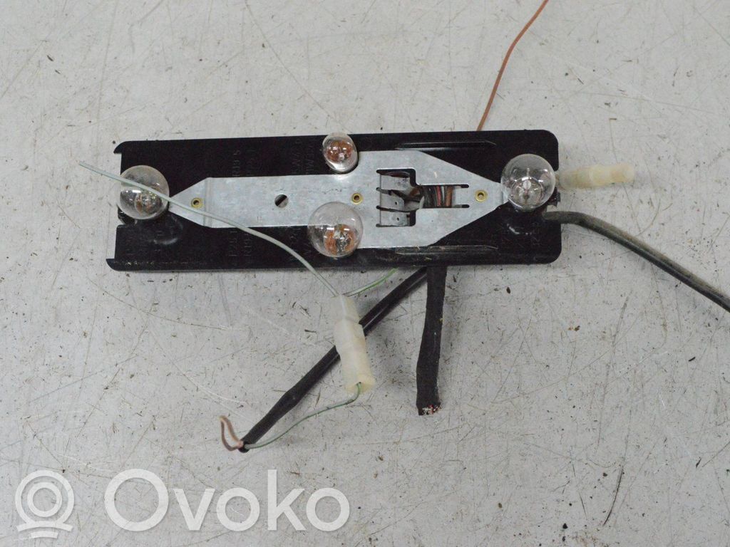 Volkswagen Golf I Aizmugures spuldzes vāka turētājs 