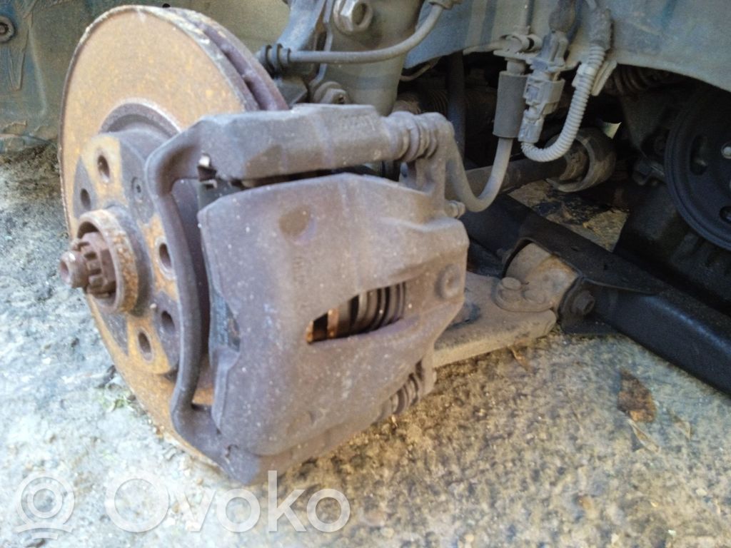 Opel Tigra B Zacisk hamulcowy przedni 