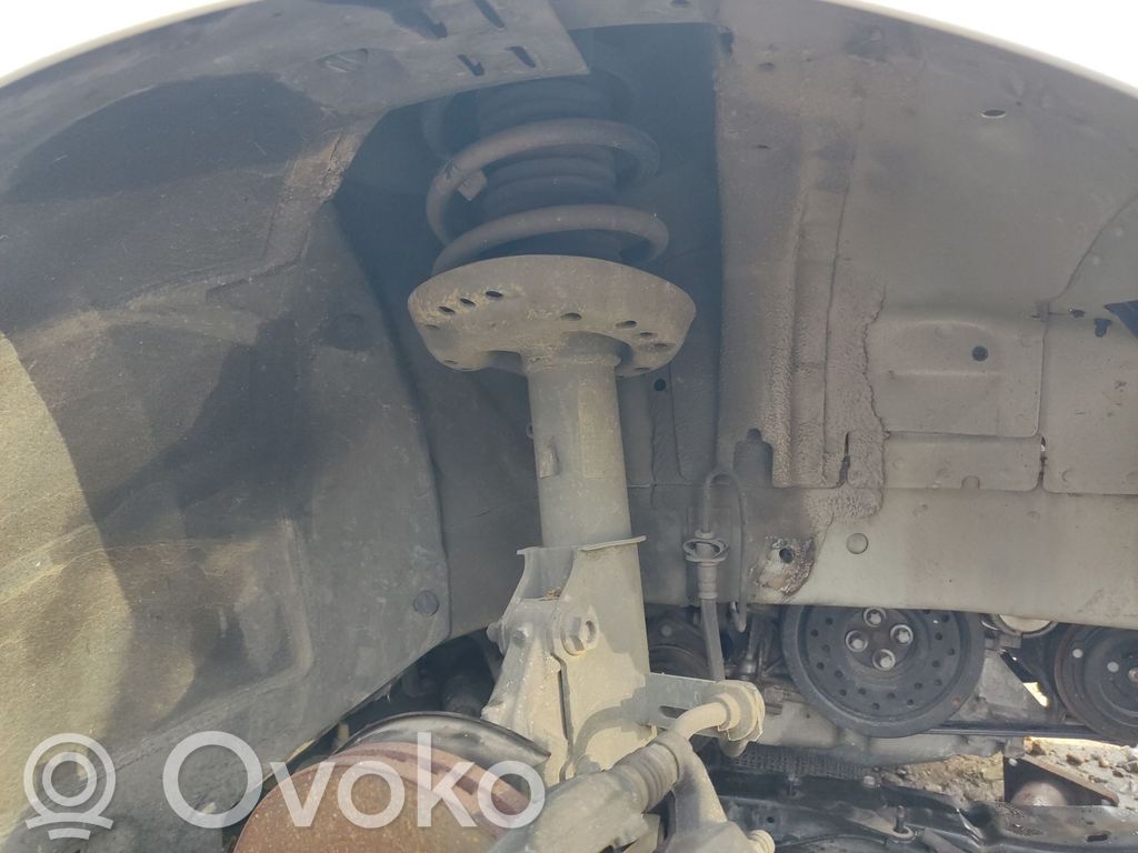 Opel Zafira C Amortyzator osi przedniej ze sprężyną 