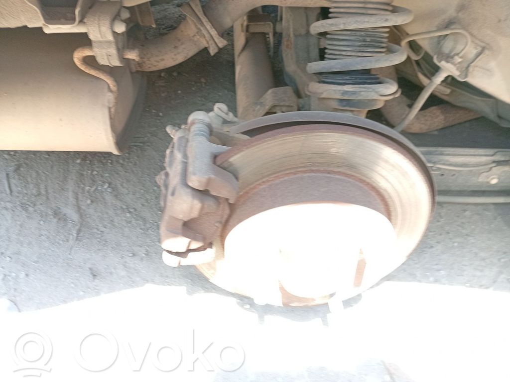 Nissan Almera N16 Mocowanie / Zacisk hamulca tylnego