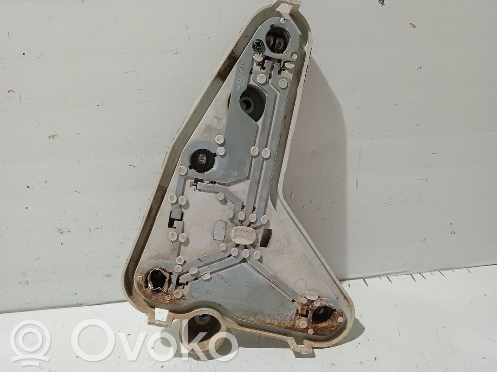 Tail light bulb cover holder