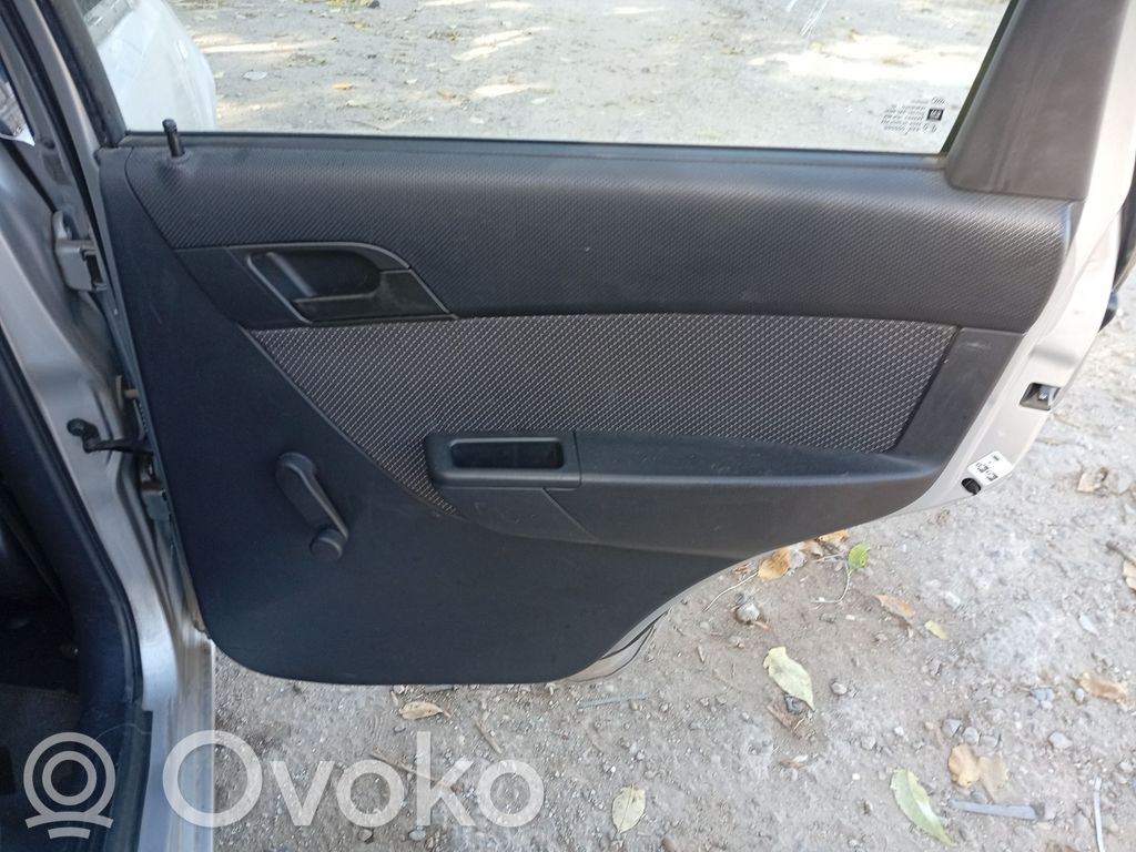 Elektryczny podnośnik szyby drzwi tylnych   94567373
