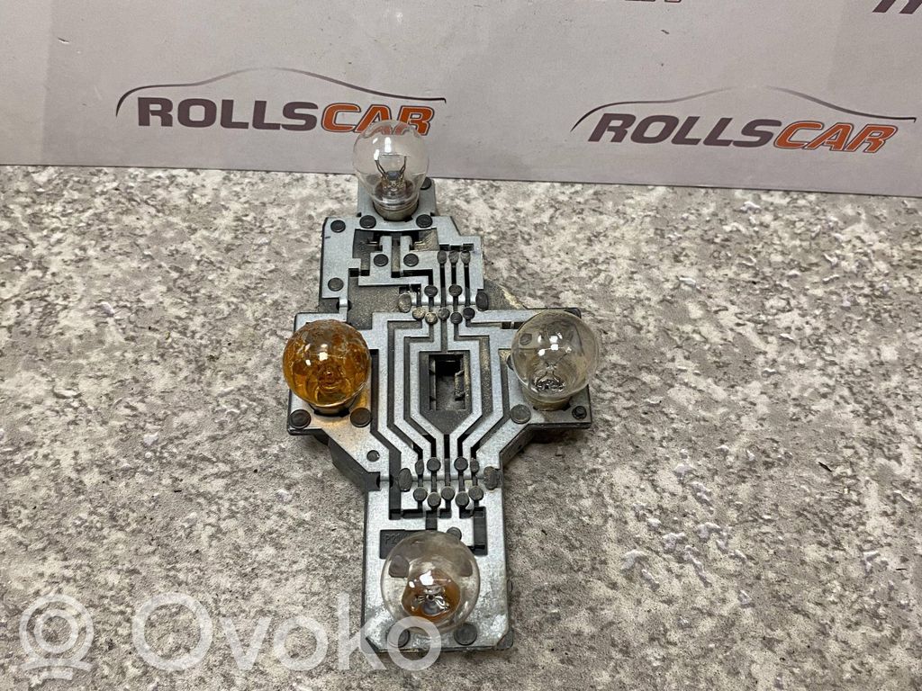 Renault Scenic I Aizmugures spuldzes vāka turētājs 