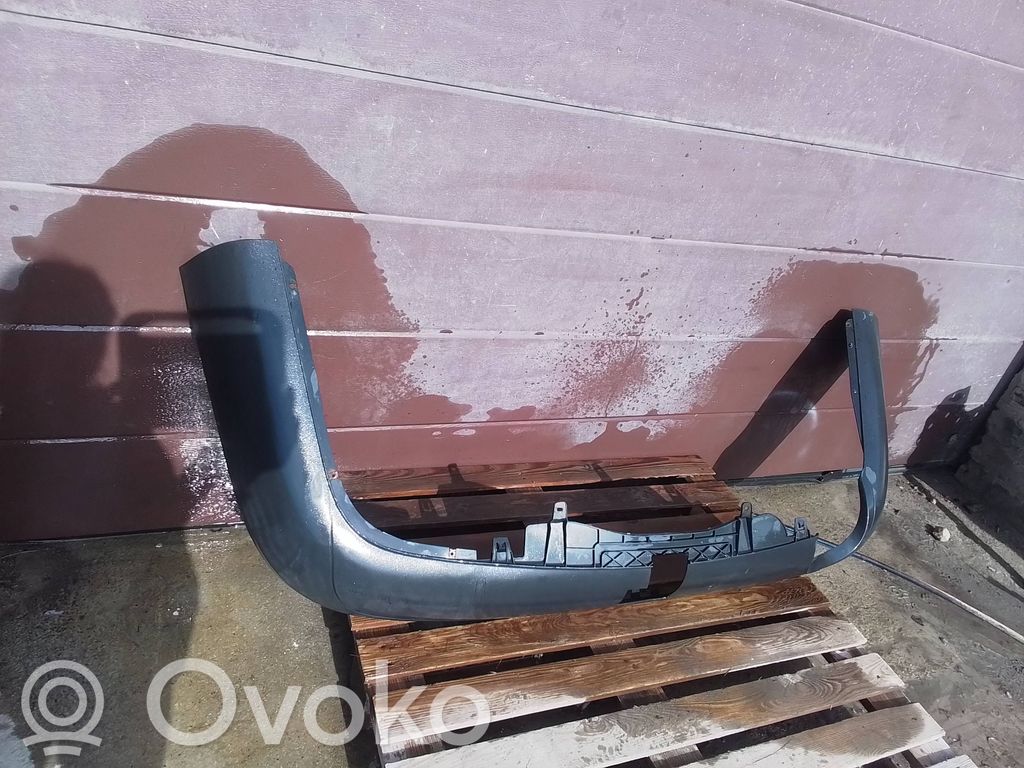 Volkswagen PASSAT B6 Moldura inferior del parachoques trasero 