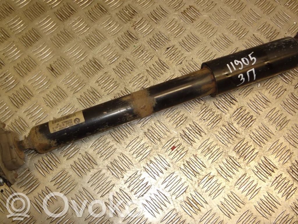 BMW 1 E81 E87 Aizmugurē amortizators 