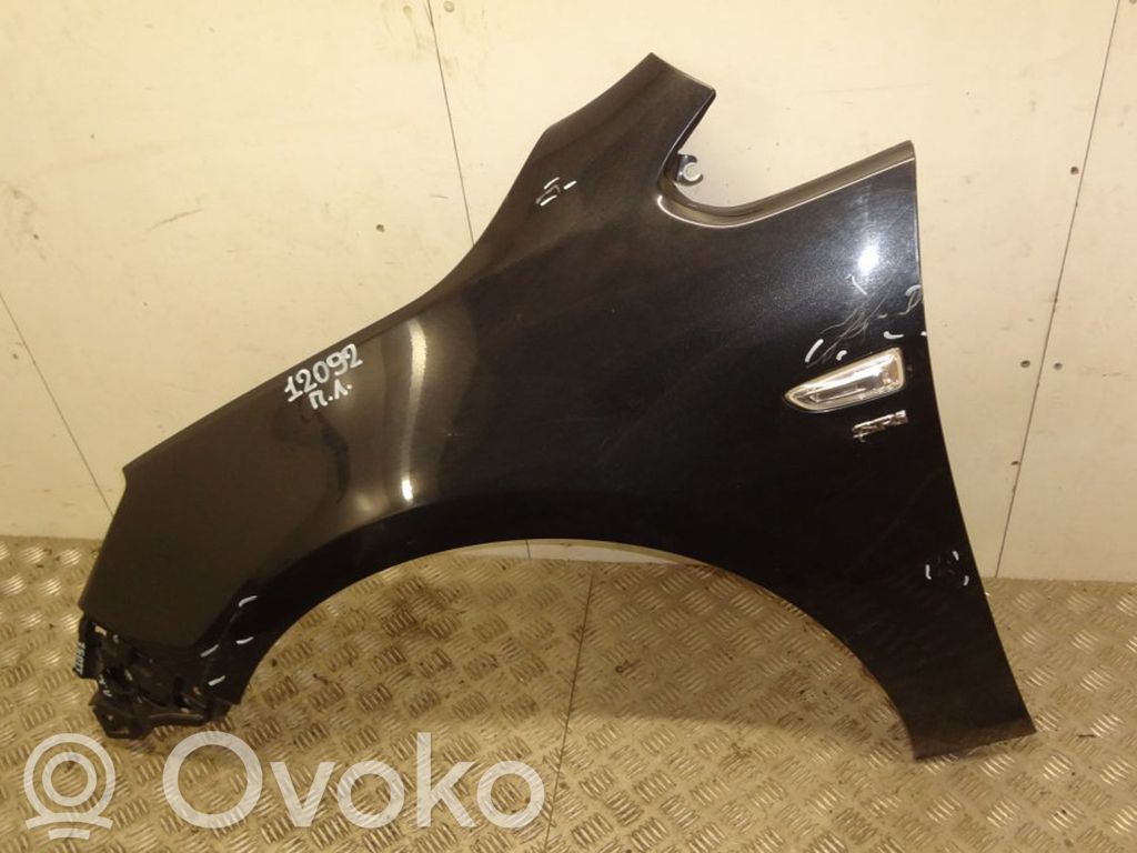 Opel Astra J Błotnik przedni 