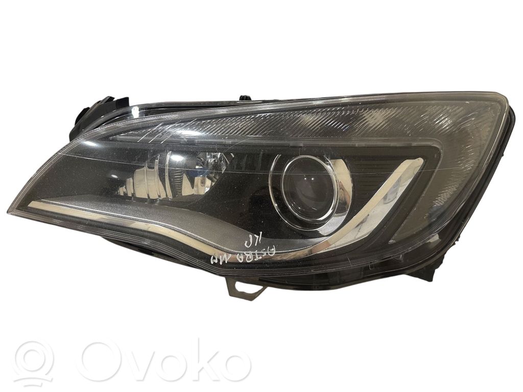 Opel Astra J Lampa przednia 