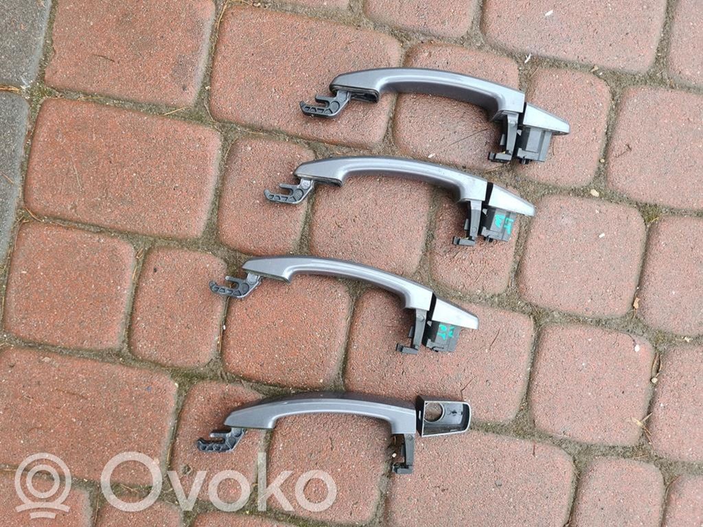 Opel Astra J Front door exterior handle 