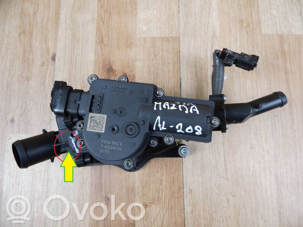 Mazda 3 Thermostat/thermostat housing 