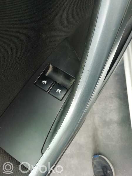 Opel Astra J Interruptor del elevalunas eléctrico 