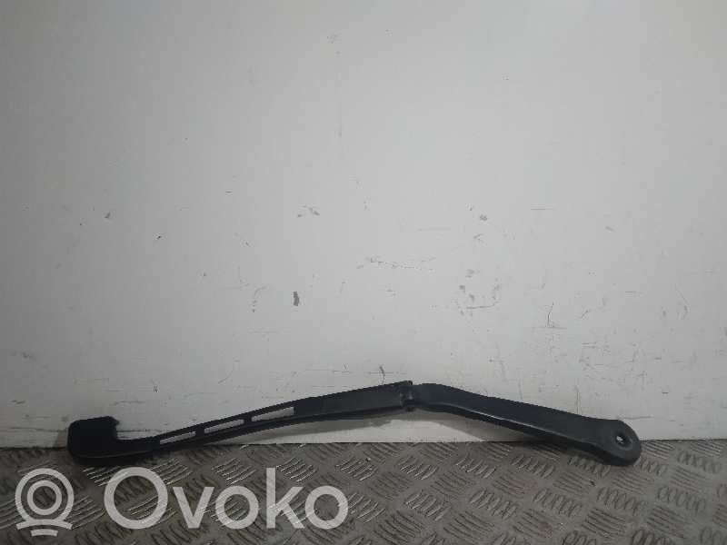 Front wiper blade arm