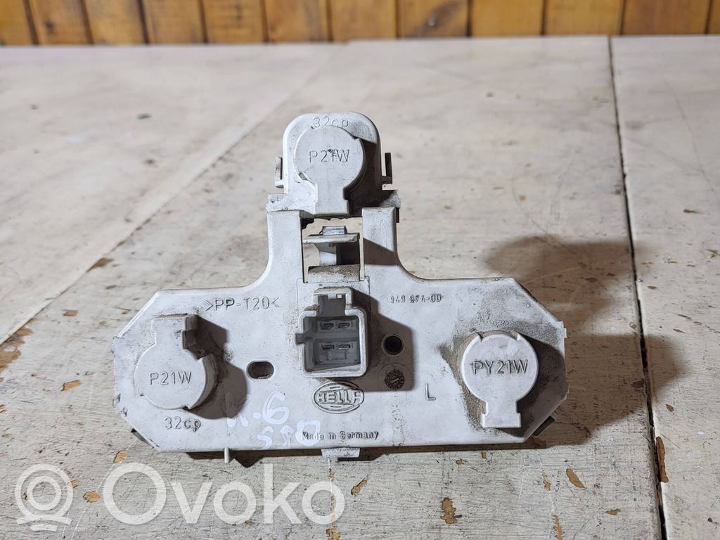 Volvo S80 Takavalon polttimon suojan pidike 