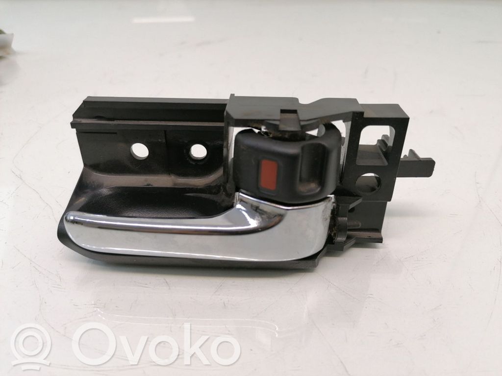 Toyota Avensis T250 Rear door interior handle 