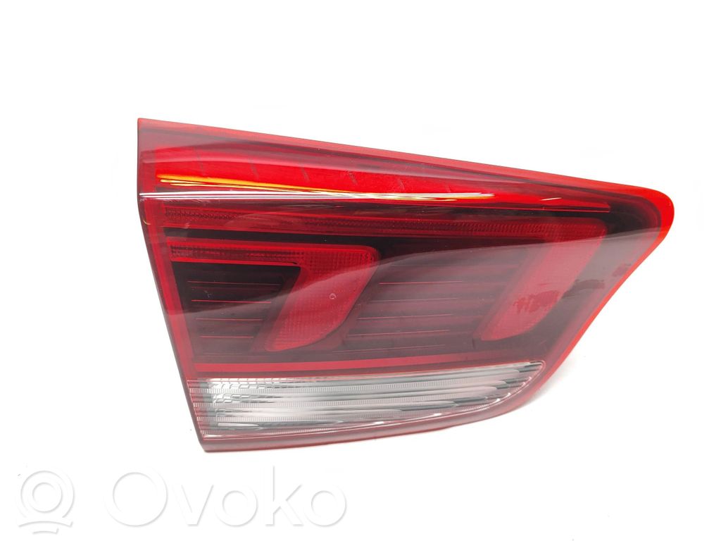 KIA Rio Galinis žibintas dangtyje 