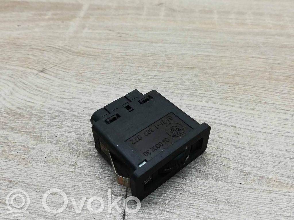 Headlight level height control switch   1387072