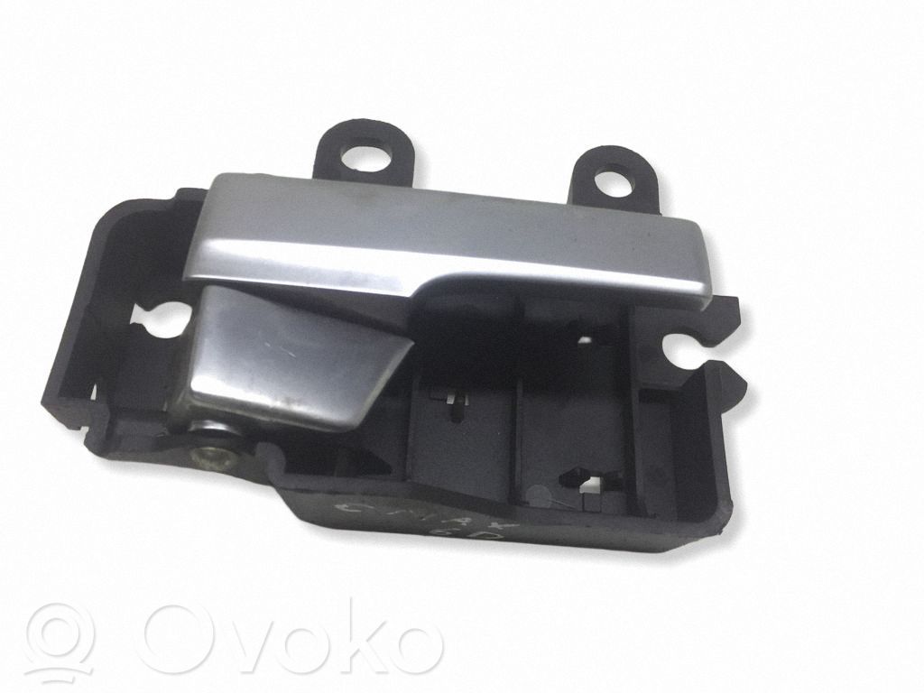 Manecilla interna puerta trasera   R22600