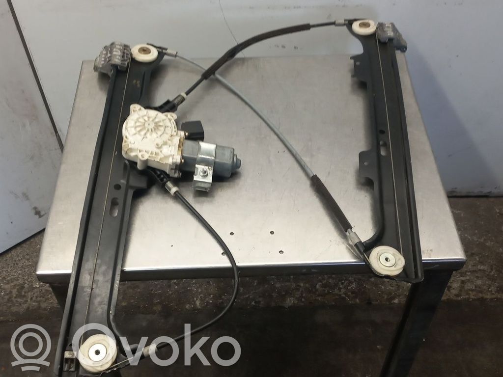 Front door window regulator with motor   7075667